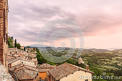 Panoramic view over tyled roofs of Montepulciano and the Dome of Sanctuary of the Madonna di San Biagio Stock Photo